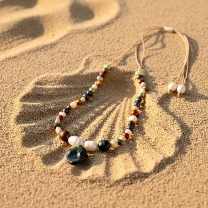 Isla Pearls: OOAK nylon adjustable necklace with green, white, copper freshwater pearls with a baroque green-blueish pendant. 