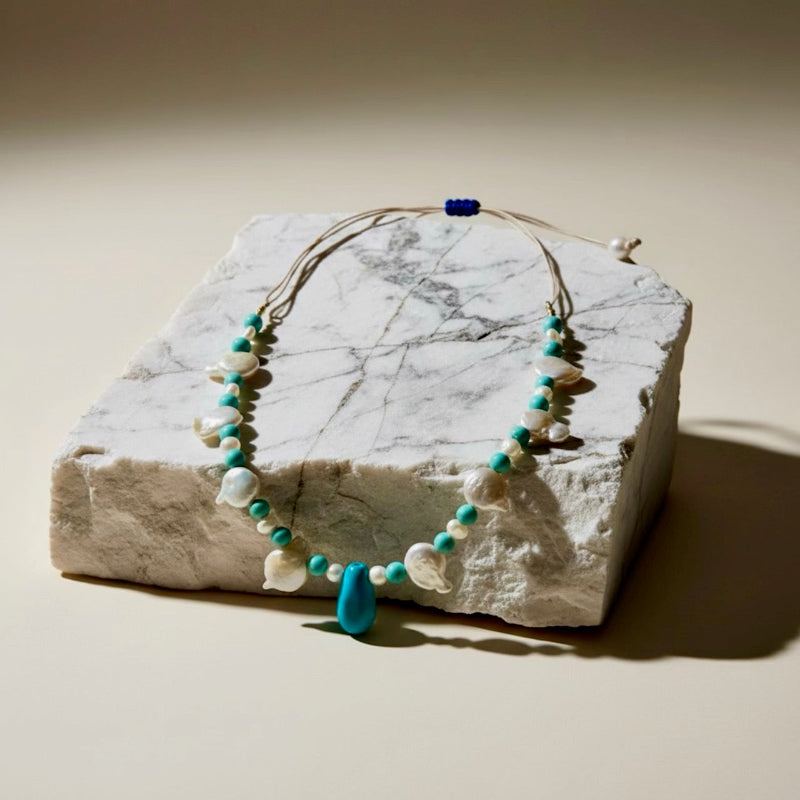 Handcrafted OOAK (one-of-a-kind) ocean-inspired adjustable necklace with turquoise stones and keshi freshwater pearls.