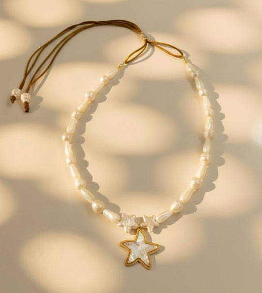 Mother of Pearl teardrop adjustable necklace with stainless steel sea star surrounded by 2 freshwater star pearls