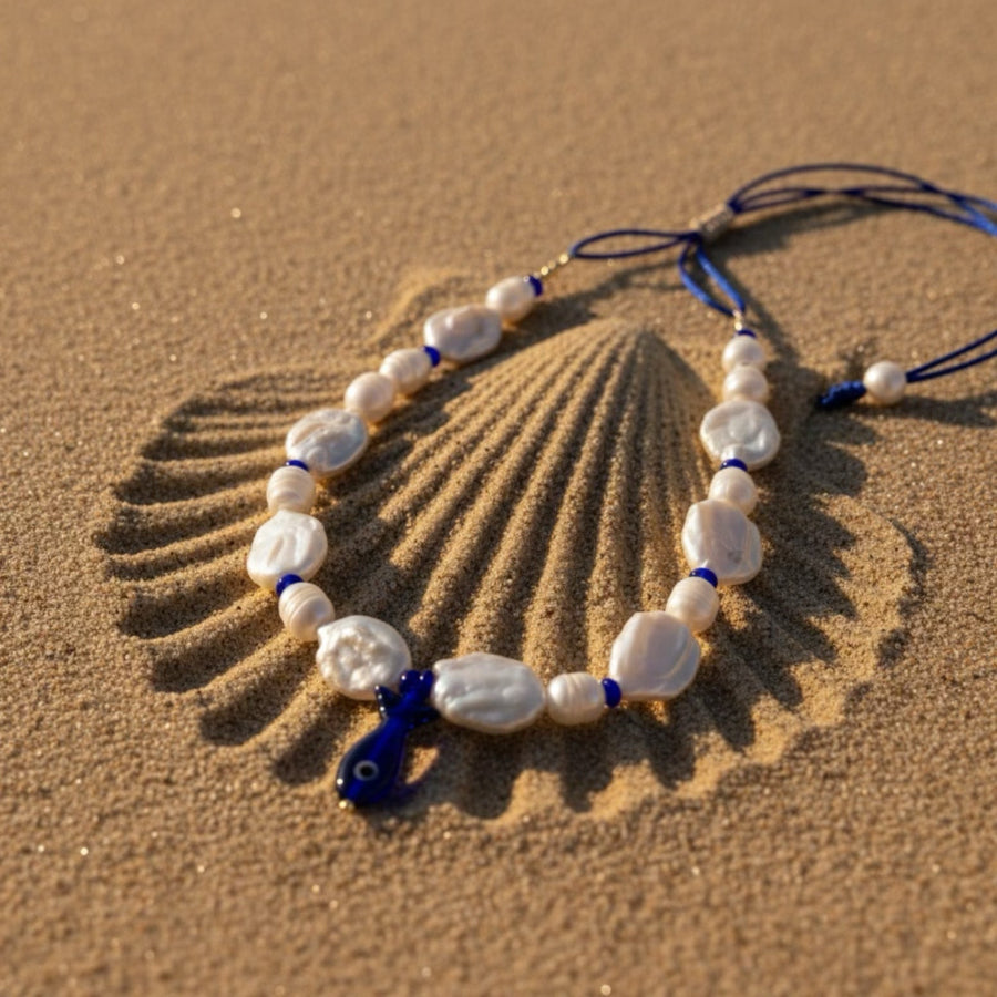 Bluefin Tides adjustable necklace, where each baroque coin pearl and freshwater ringed pearl reflects the beauty of imperfection and authenticity. 
