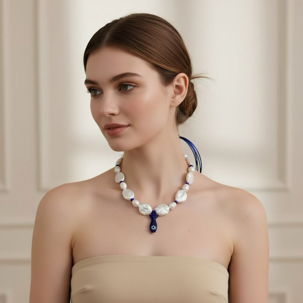 Bluefin Tides adjustable necklace, where each baroque coin pearl and freshwater ringed pearl reflects the beauty of imperfection and authenticity. 