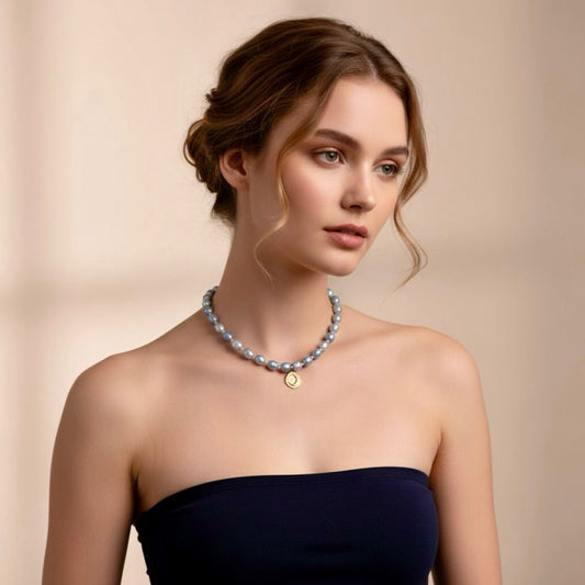 The Blue Moon adjustable necklace captures serenity and hope with blue freshwater pearls - symbols of tranquility and calm - gently linked by warm beige beads that embody balance and connection to the earth. 