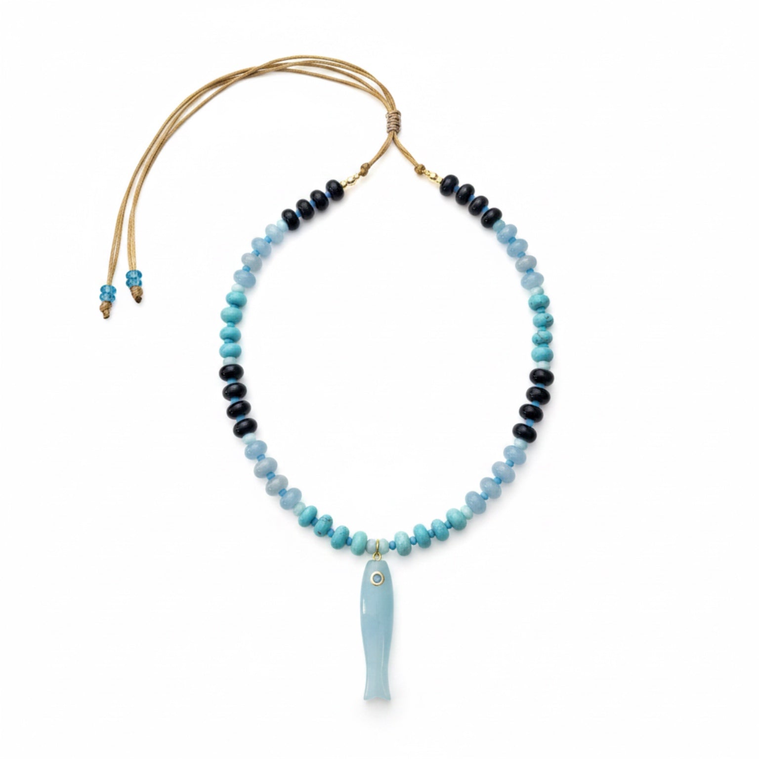 Necklace with blue fish pendant on a white background